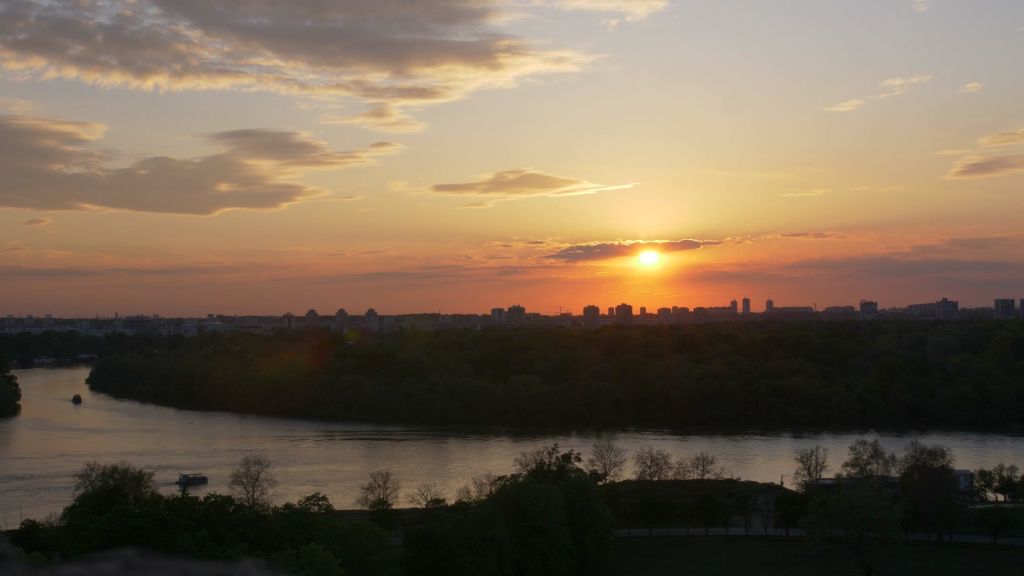 Panoramic view of Belgrade and the confluence of the Sava and Danube rivers at sunset